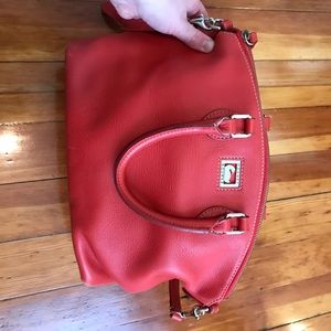 Much loved poppy colored Dooney & Burke bag